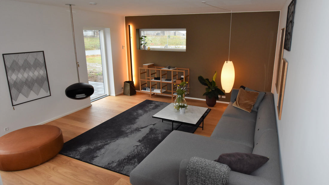 Cocoon Aeris black suspended fireplace in architectural interior