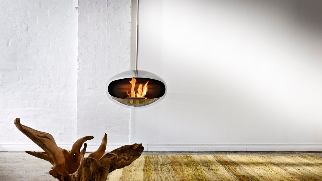 Cocoon Aeris stainless steel hanging fireplace in contemporary living space