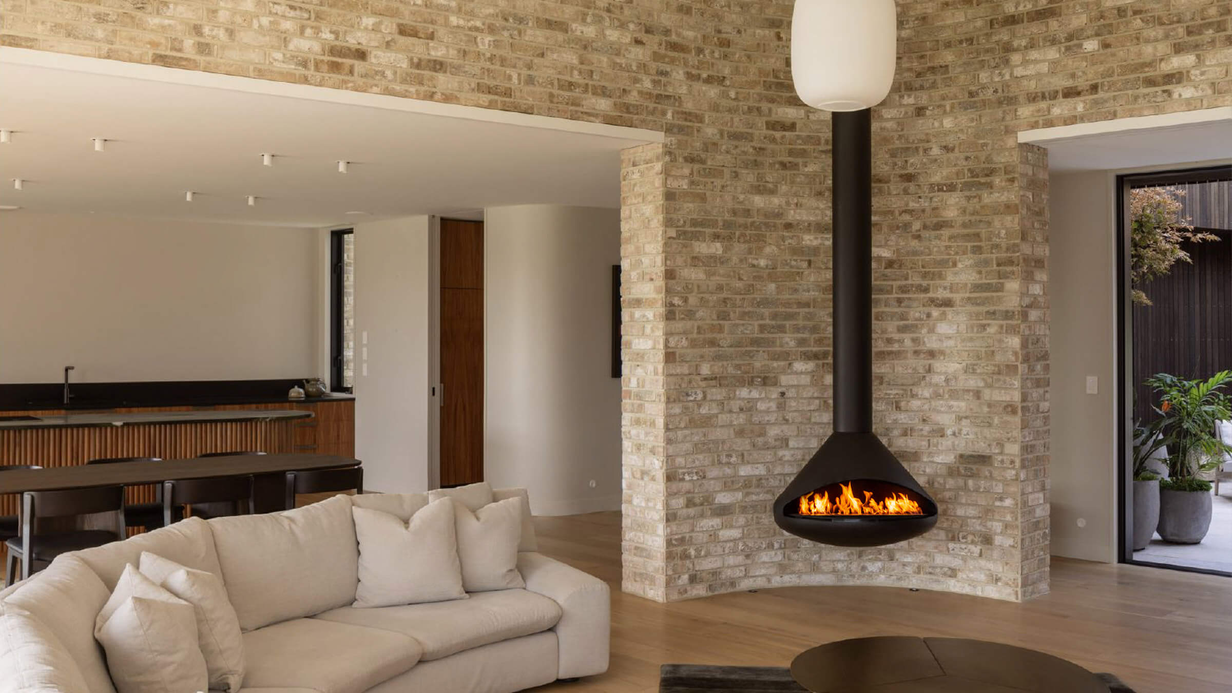 Orbit black hanging fireplace in contemporary home