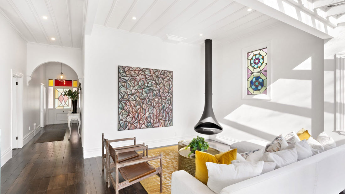 Silo suspended fireplace in a living room