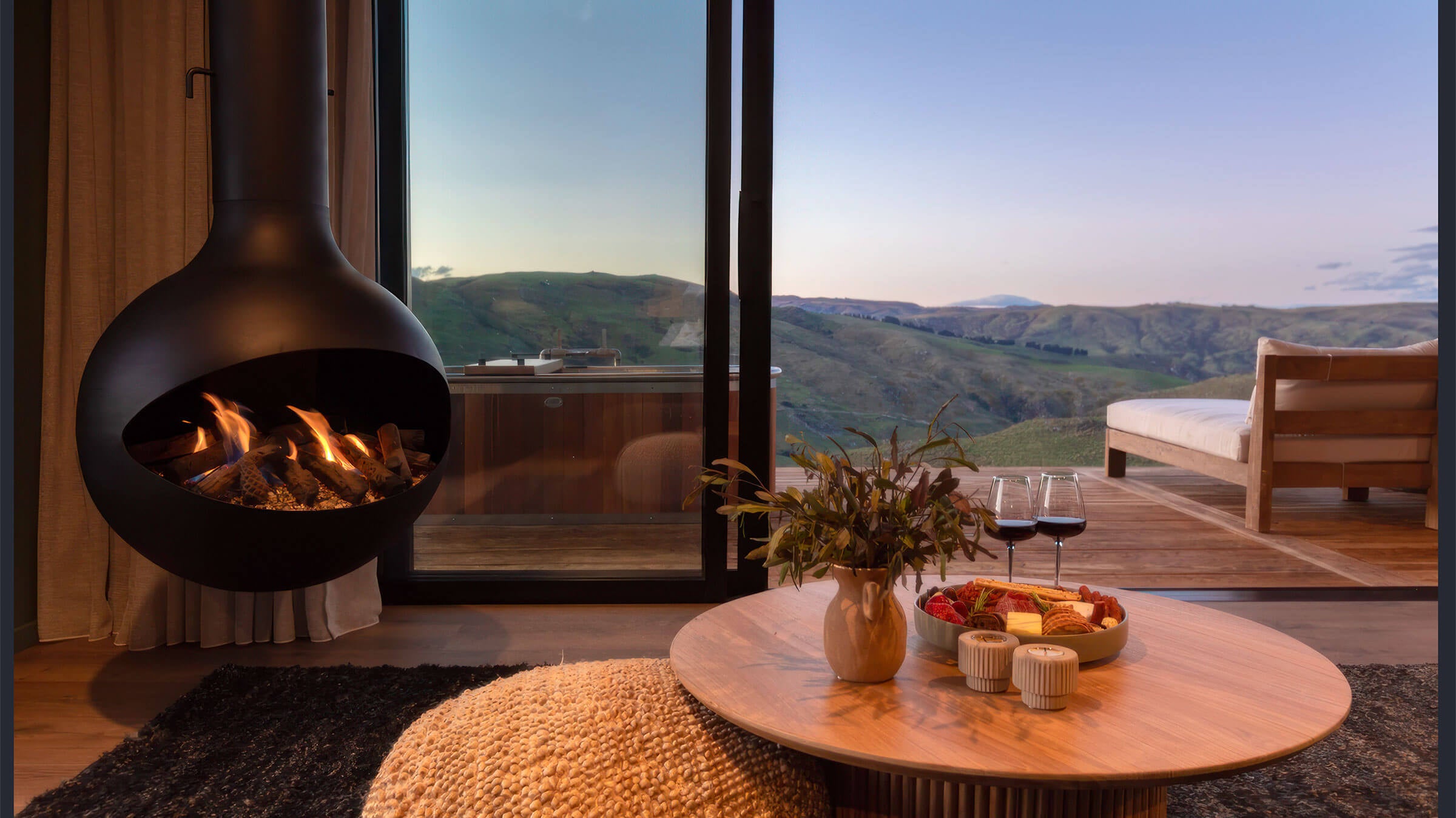 Sphere black hanging fireplace in modern architectural interior