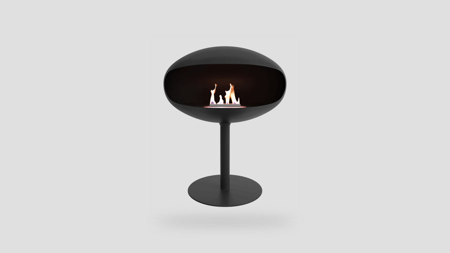 Cocoon Pedestal freestanding fireplace, matte black shell, matte black pedestal, studio
